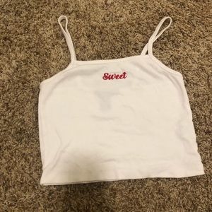 white cropped tank with red embroidered “sweet”